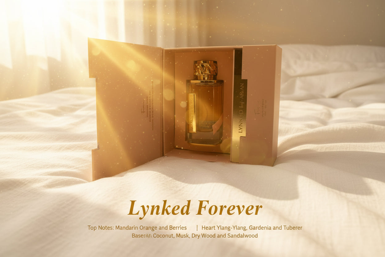 Gold perfume bottle in an open beige box on a white background