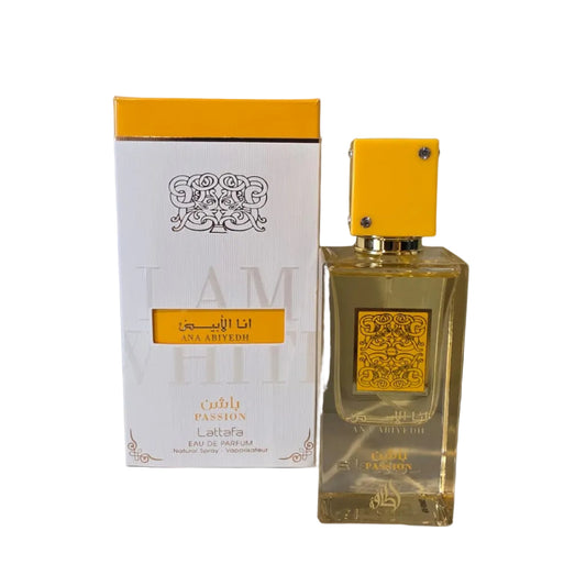 Perfume bottle and packaging with yellow cap and label on a gray background