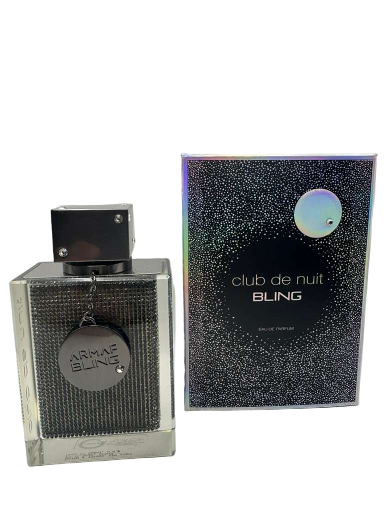 Bling-ed perfume bottle and packaging on a white background