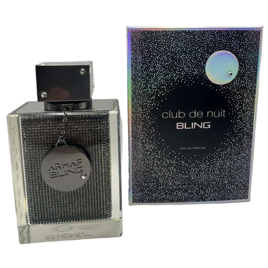Bling-ed perfume bottle and packaging on a white background