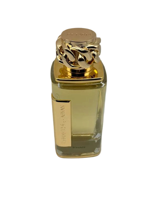 Gold perfume bottle with a gold cap on a white background