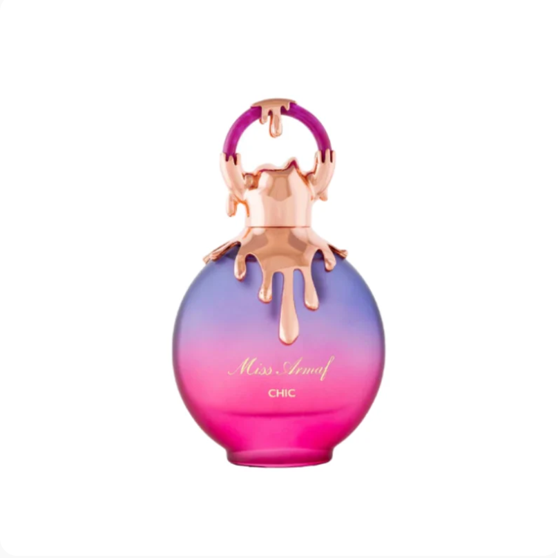 Miss Chiffon Chic perfume bottle with a vibrant pink and purple gradient body, a metallic rose gold dripping cap, and a matching pink ring handle, set against a plain white background.
