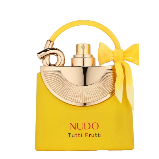Nudo Tutti Frutti perfume bottle with gold cap and yellow bow on a white background